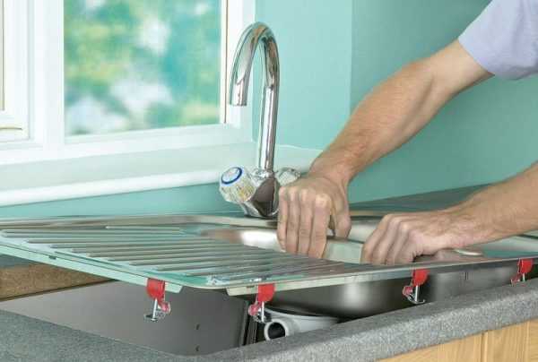 Процесс установки железной мойки Установка раковины