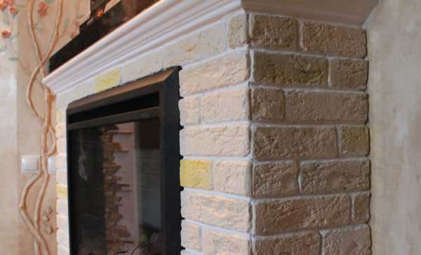 Отделка камина камнем Облицовка камина искусственным камнем