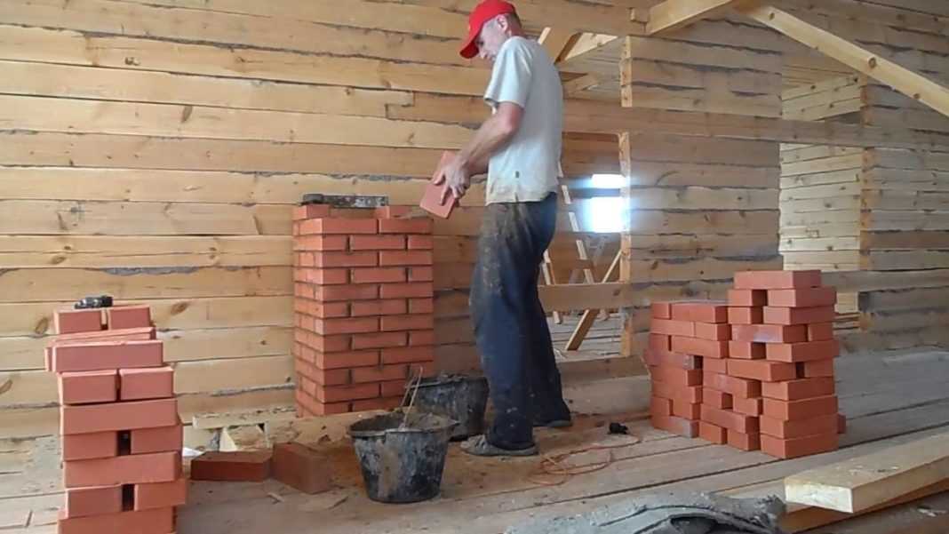 Минусом печи с лежанкой является сложность возведения Печь с лежанкой